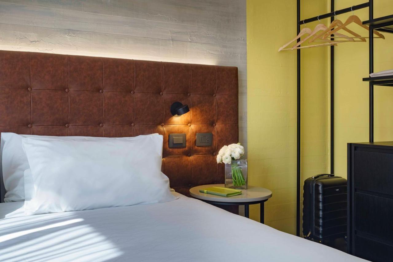 Готель Pullman Santiago El Bosque Екстер'єр фото A room at the hotel