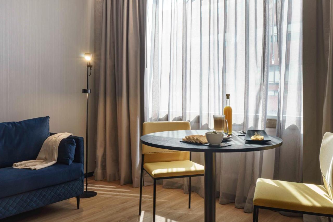 Готель Pullman Santiago El Bosque Екстер'єр фото A room at the hotel